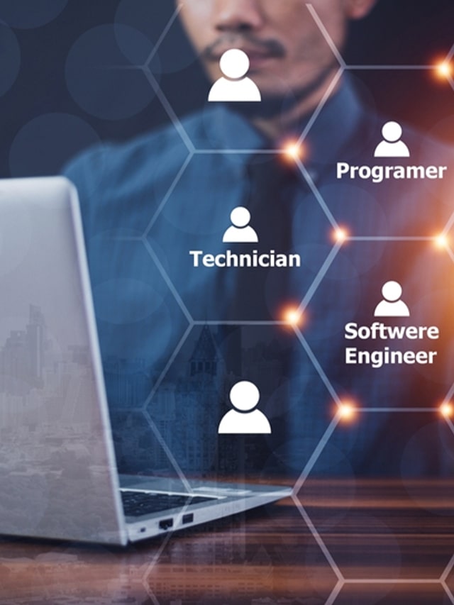 Online and modern technologies. Man with a laptop pressing virtual technlogies button; concept of 5 Programming Languages to Land a Job at Google in 2024